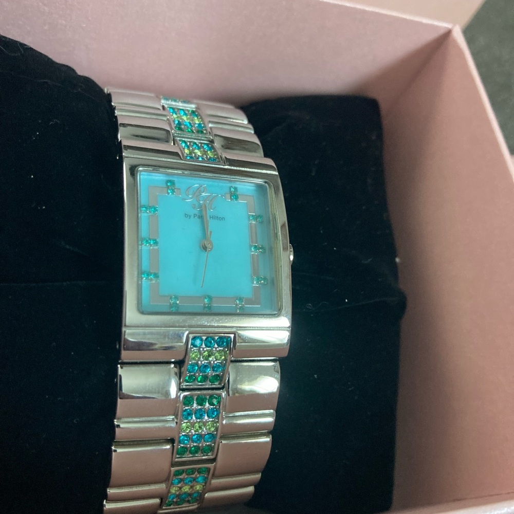 Paris Hilton Silver Watch with aqua face - Picture 2 of 12
